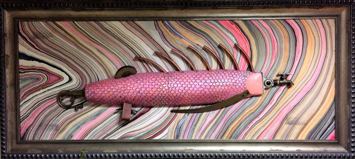 narrow spiky big pink fish